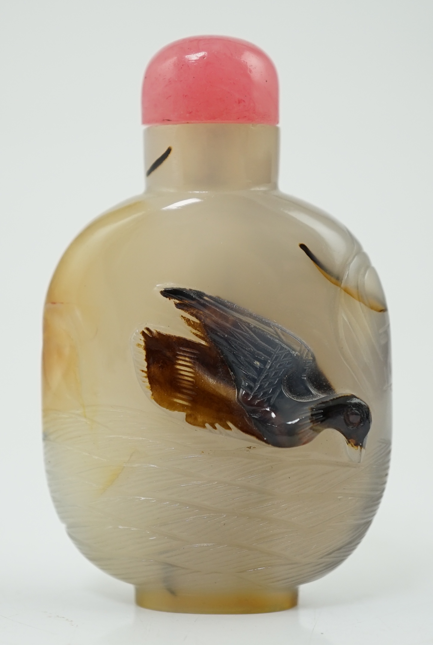 A Chinese shadow/cameo agate 'duck in a pond' snuff bottle, 19th/20th century